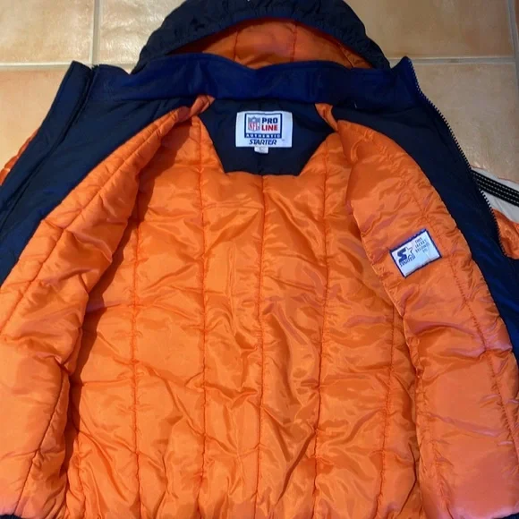 This is a boy’s large jacket. It is 100% polyester. The shell is 100% nylon. - Picture 6 of 6